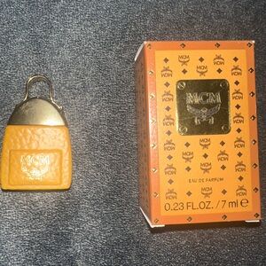 MCM Eau de Parfum 0.23 fl oz bottle, used about 75% full